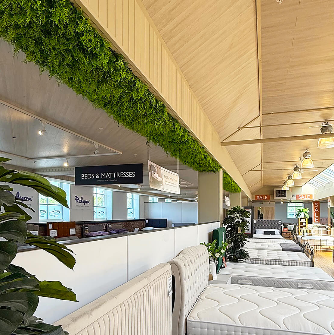 Ceiling installation artificial foliage conifer.